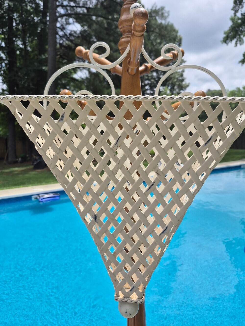 White Washed White Metal Lattice hanging planter basket with scrollwork detail